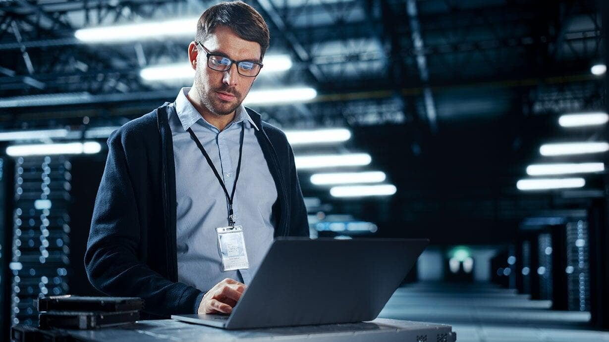 Technician working on a laptop